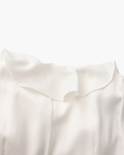 Vestido midi con volantes y botones de perla