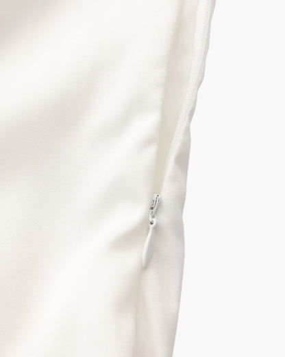 Vestido midi con volantes y botones de perla